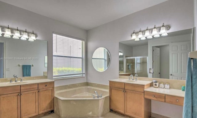 5342 SW 173rd Ave, Miramar, FL 33029 - bathroom with a stall shower, a bath, two vanities, and tile patterned flooring