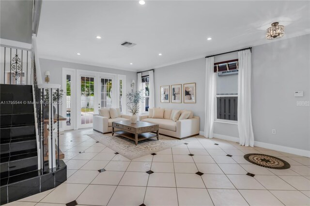 15862 SW 24th St, Miramar, FL 33027 - living area with recessed lighting, light tile patterned floors, and french doors
