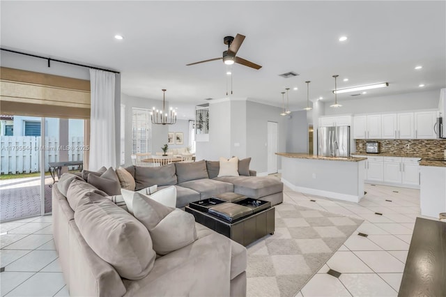 15862 SW 24th St, Miramar, FL 33027 - living area featuring a ceiling fan, light tile patterned floors, recessed lighting, and a chandelier