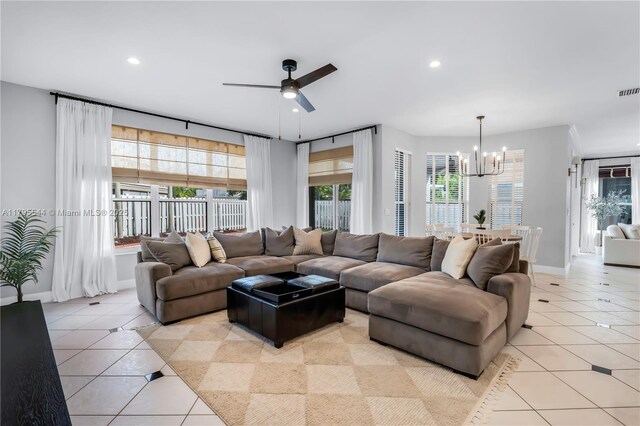 15862 SW 24th St, Miramar, FL 33027 - living room with light tile patterned flooring, a chandelier, ceiling fan, and recessed lighting