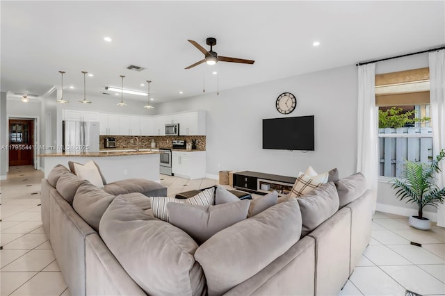15862 SW 24th St, Miramar, FL 33027 - living room with ceiling fan, light tile patterned flooring, and recessed lighting