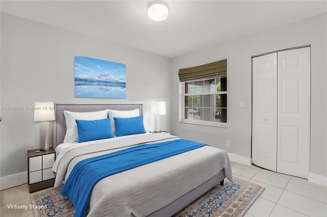 15862 SW 24th St, Miramar, FL 33027 - tiled bedroom with baseboards and a closet
