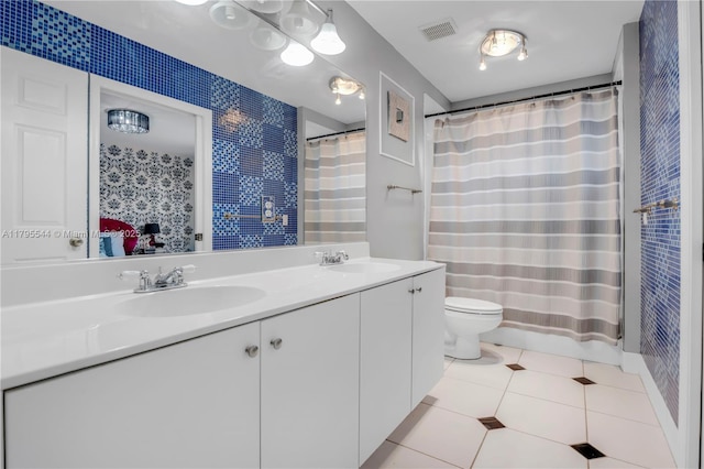 15862 SW 24th St, Miramar, FL 33027 - full bath with double vanity, tile patterned flooring, and a shower with shower curtain
