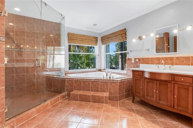 15862 SW 24th St, Miramar, FL 33027 - full bathroom with vanity, a bath, crown molding, a shower stall, and marble finish flooring