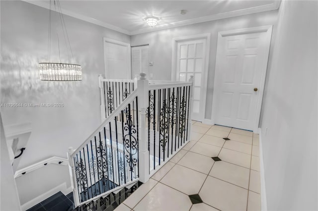 15862 SW 24th St, Miramar, FL 33027 - hallway featuring an upstairs landing, tile patterned floors, and crown molding