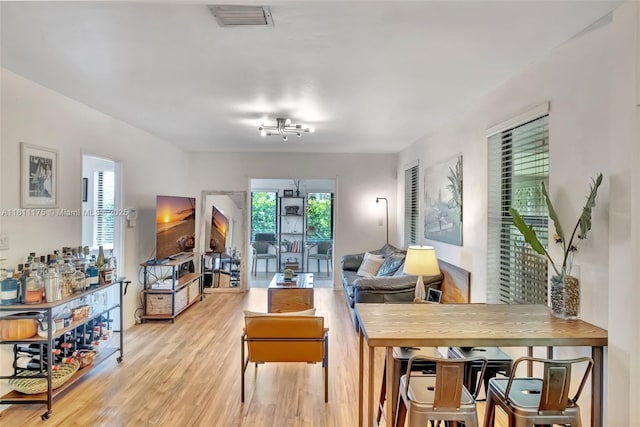 2763 NW 3rd St, Miami, FL 33125 - living room with light wood-type flooring