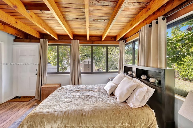 2763 NW 3rd St, Miami, FL 33125 - bedroom with wooden ceiling with exposed beams and wood finished floors