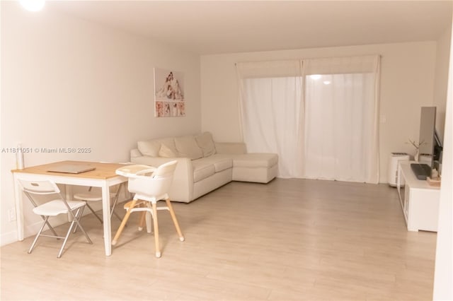 2200 S Cypress Bend Dr Unit 204, Pompano Beach, FL 33069 - living room with light wood-style floors