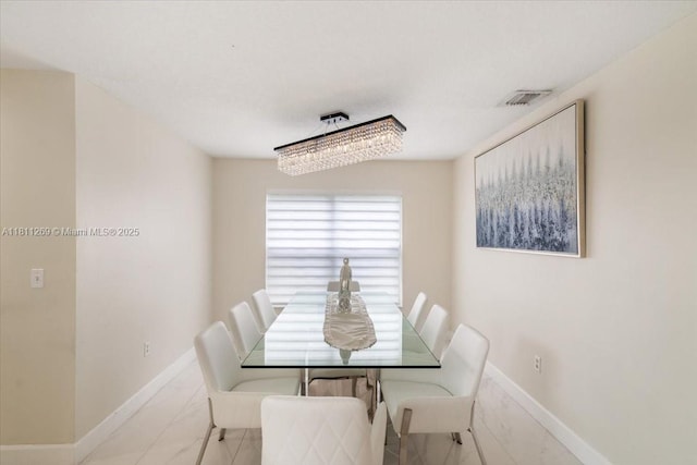 16466 SW 29th St, Miramar, FL 33027 - dining room featuring baseboards and marble look tiles