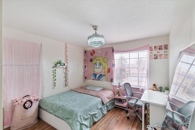 16466 SW 29th St, Miramar, FL 33027 - bedroom with wood finished floors and a desk