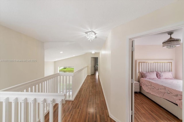 16466 SW 29th St, Miramar, FL 33027 - hallway with wood finished floors, baseboards, recessed lighting, and an upstairs landing