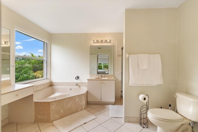 16466 SW 29th St, Miramar, FL 33027 - bathroom featuring healthy amount of natural light, a bath, vanity, and tile patterned floors
