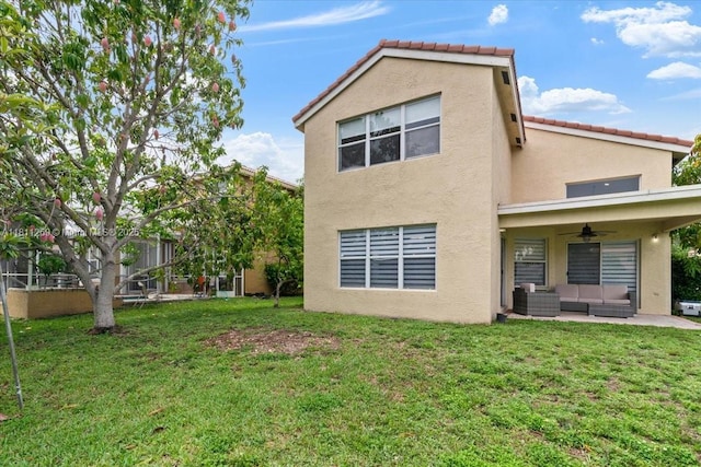 16466 SW 29th St, Miramar, FL 33027 - rear view of property featuring an outdoor living space, a ceiling fan, stucco siding, and a yard