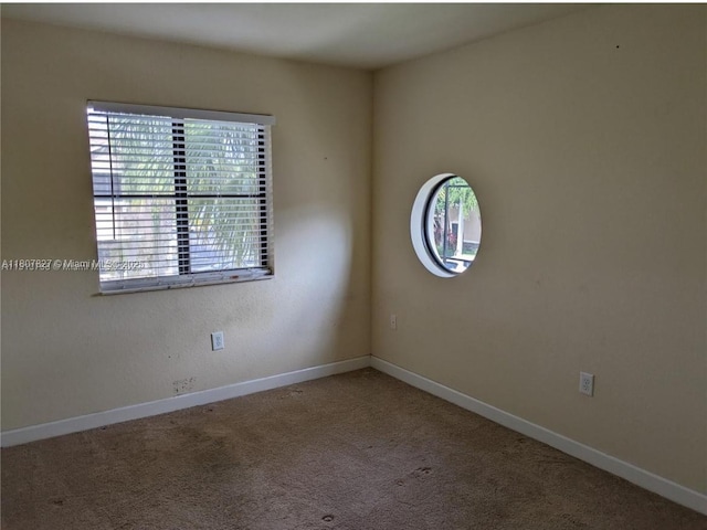22411 SW 88th Pl Unit 9-26, Cutler Bay, FL 33190 - carpeted spare room with baseboards