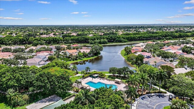 930 Briar Ridge Rd, Weston, FL 33327 - aerial view of property's location featuring a nearby body of water, a pool area, and nearby suburban area
