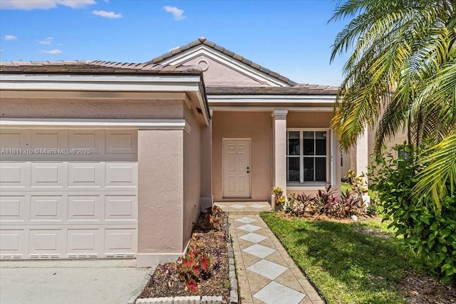 930 Briar Ridge Rd, Weston, FL 33327 - view of front facade with stucco siding and an attached garage