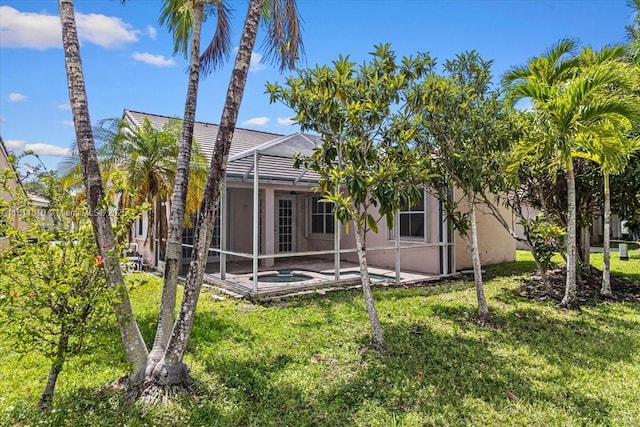 930 Briar Ridge Rd, Weston, FL 33327 - rear view of house featuring a lawn, stucco siding, a lanai, a pool, and a patio