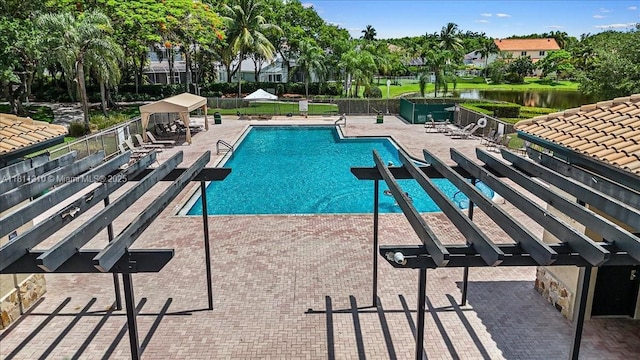 930 Briar Ridge Rd, Weston, FL 33327 - community pool featuring a water view and a patio