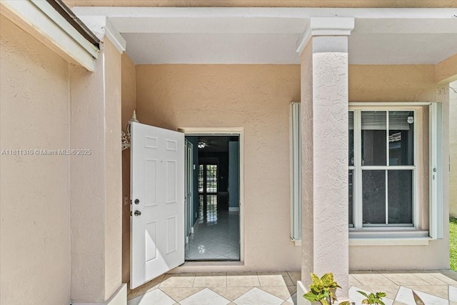 930 Briar Ridge Rd, Weston, FL 33327 - view of exterior entry featuring stucco siding