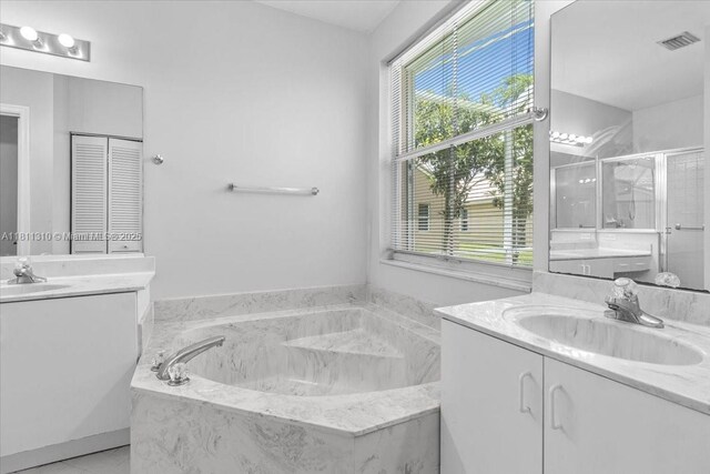 930 Briar Ridge Rd, Weston, FL 33327 - full bathroom featuring vanity, a bath, and a stall shower