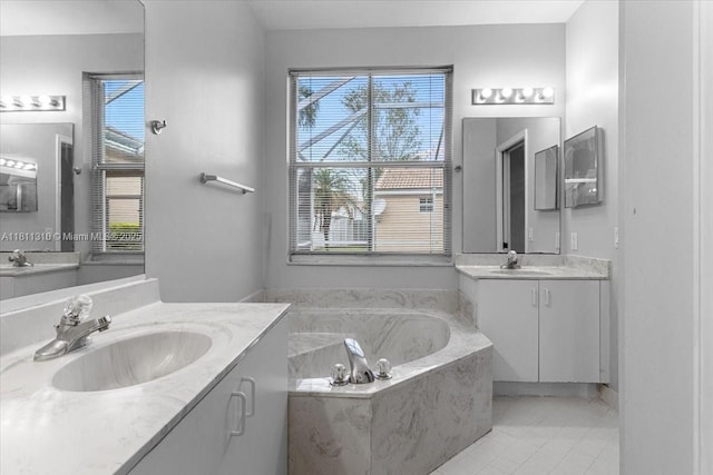 930 Briar Ridge Rd, Weston, FL 33327 - full bathroom featuring two vanities, a garden tub, and tile patterned floors