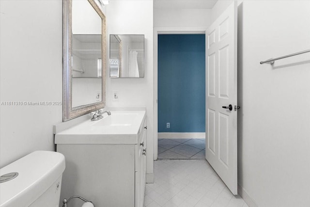 930 Briar Ridge Rd, Weston, FL 33327 - bathroom featuring vanity, tile patterned flooring, toilet, and baseboards