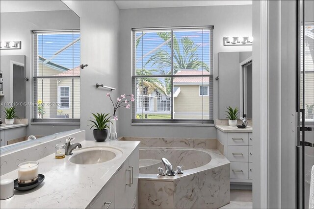 930 Briar Ridge Rd, Weston, FL 33327 - full bathroom with vanity, a bath, and healthy amount of natural light