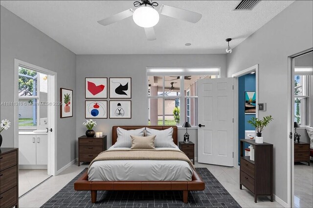 930 Briar Ridge Rd, Weston, FL 33327 - bedroom with multiple windows, ensuite bath, and baseboards