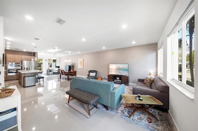 6645 NW 103rd Path, Doral, FL 33178 - living area featuring recessed lighting and baseboards