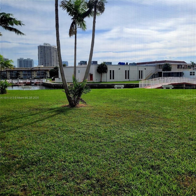 2905 Point E Dr Unit L402, Aventura, FL 33160 - view of green lawn featuring a water view