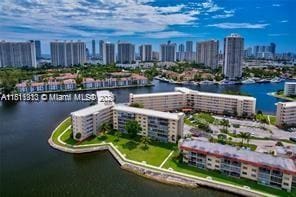 2905 Point E Dr Unit L402, Aventura, FL 33160 - aerial view of city skyline and a nearby body of water