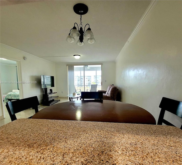 2905 Point E Dr Unit L402, Aventura, FL 33160 - dining space with ornamental molding and a chandelier