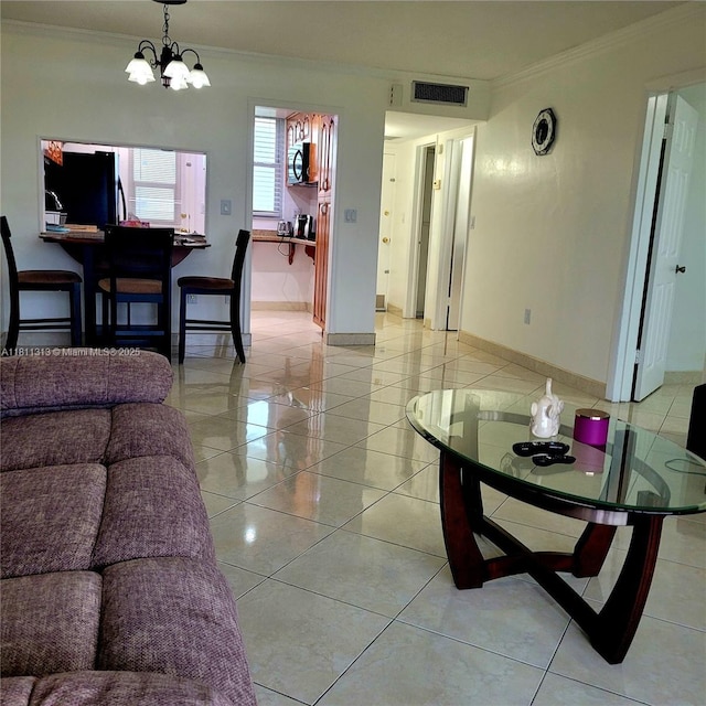 2905 Point E Dr Unit L402, Aventura, FL 33160 - living room featuring ornamental molding, light tile patterned flooring, baseboards, and a chandelier
