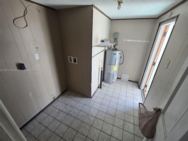 1521 Richmond Rd, Lakeland, FL 33805 - washroom with electric water heater, light tile patterned flooring, a textured ceiling, wooden walls, and crown molding