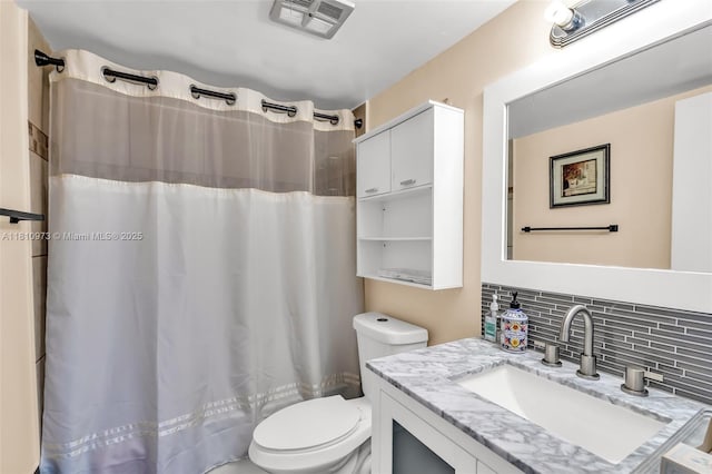 2316 SW 81st Way Unit 8, North Lauderdale, FL 33068 - full bathroom featuring toilet, vanity, backsplash, and curtained shower