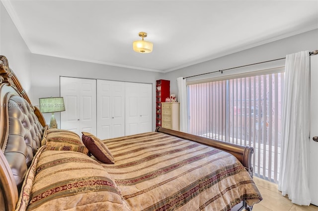 2316 SW 81st Way Unit 8, North Lauderdale, FL 33068 - bedroom featuring a closet, light tile patterned floors, and crown molding