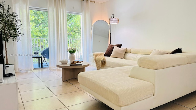 5122 NW 79th Ave Unit 301, Doral, FL 33166 - living room featuring light tile patterned floors