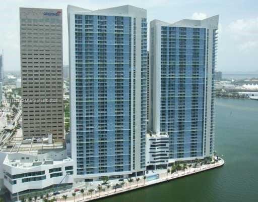325 S Biscayne Blvd Unit 14, Miami, FL 33131 - view of building exterior with a water view and a view of city