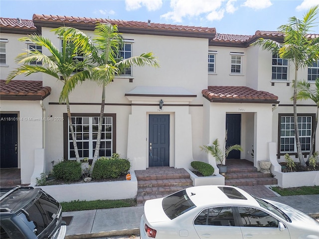 9471 SW 171st Pl, Miami, FL 33196 - view of front of home featuring a tiled roof and stucco siding