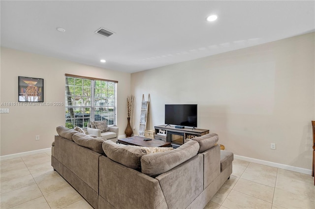 9471 SW 171st Pl, Miami, FL 33196 - living area featuring light tile patterned flooring, recessed lighting, and baseboards