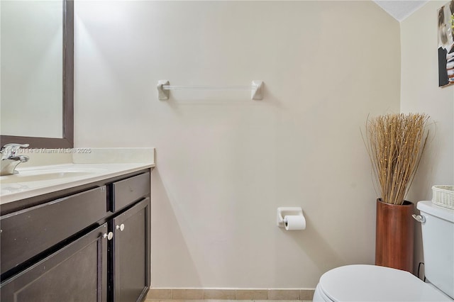 9471 SW 171st Pl, Miami, FL 33196 - half bathroom with toilet, vanity, baseboards, and tile patterned floors