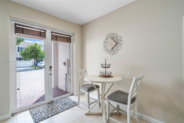 9471 SW 171st Pl, Miami, FL 33196 - dining room with baseboards and light tile patterned floors