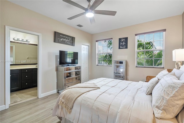 9471 SW 171st Pl, Miami, FL 33196 - bedroom featuring light wood-style flooring, baseboards, ensuite bathroom, ceiling fan, and a closet