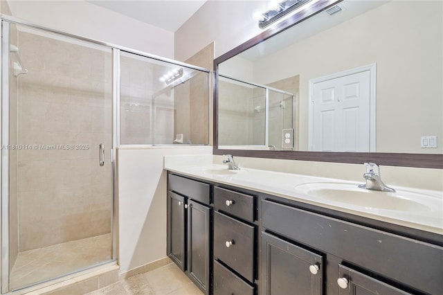 9471 SW 171st Pl, Miami, FL 33196 - bathroom with double vanity, a stall shower, and tile patterned floors