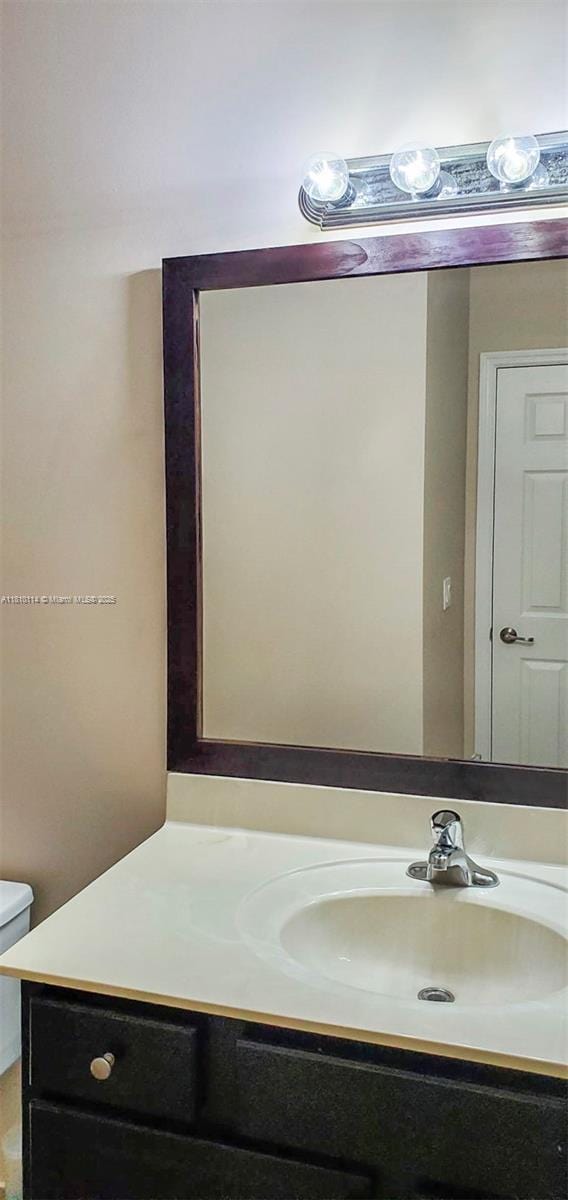 9471 SW 171st Pl, Miami, FL 33196 - bathroom with vanity and toilet