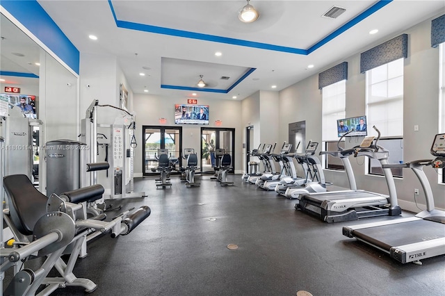 9471 SW 171st Pl, Miami, FL 33196 - gym with a raised ceiling, a towering ceiling, recessed lighting, and baseboards