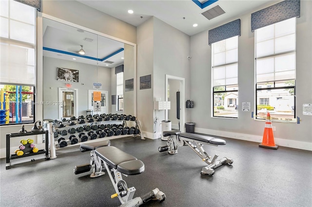9471 SW 171st Pl, Miami, FL 33196 - exercise room featuring a towering ceiling, baseboards, and recessed lighting