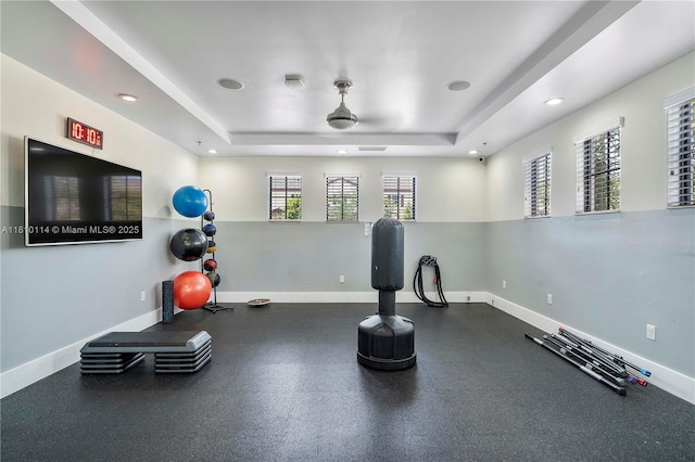 9471 SW 171st Pl, Miami, FL 33196 - workout room with a tray ceiling, baseboards, and recessed lighting