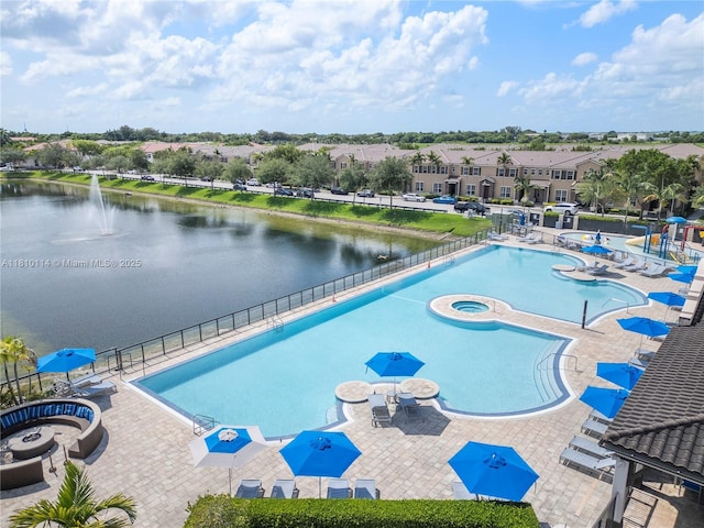 9471 SW 171st Pl, Miami, FL 33196 - community pool featuring a water view and a patio area