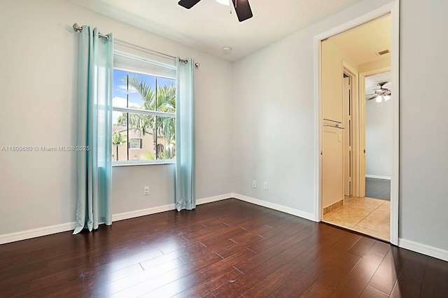 4631 Mediterranean Cir, Palm Beach Gardens, FL 33418 - spare room with ceiling fan, wood finished floors, and baseboards